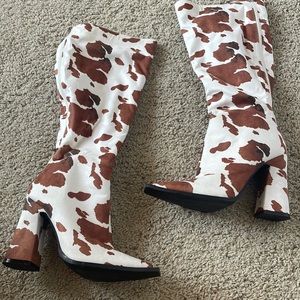 Nasty gal cow print knee high boot